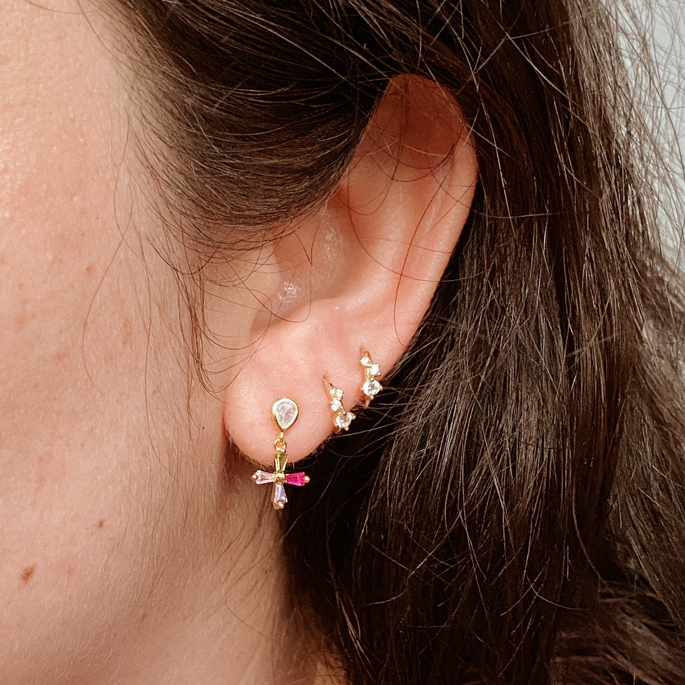 Cross studs desiguales